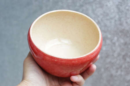 handmade ceramic bowl. clay covered with glaze and passed two firingの写真素材
