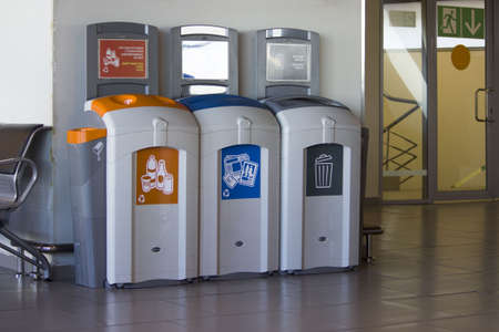 Different Colored Bins For Collection Of Recycle Materials in airport.の写真素材