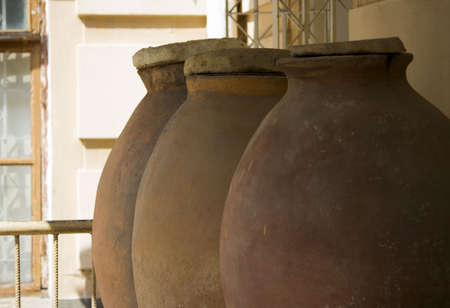 large ancient pithos clay vessels for storing wine, cereals and other products. vertical photo. south of Russiaの写真素材