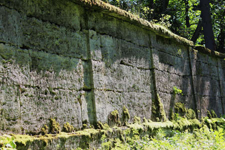ancient wall that separates two parts of the park from each other. Eighteenth century. Stone and historyの写真素材