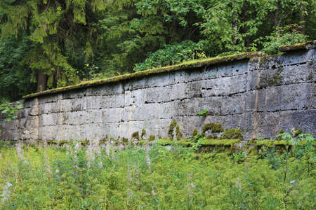 ancient wall that separates two parts of the park from each other. Eighteenth century. Stone and historyの写真素材