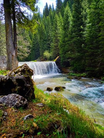 Rapid waterfall in the mountains