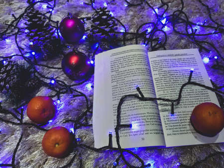 Christmas Decoration and book with opened pages.の写真素材