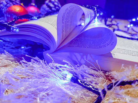 Book with opened pages and shape of heart.の写真素材