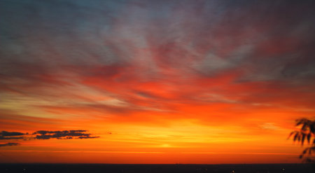 Fire in the skies and burning cloudsの写真素材