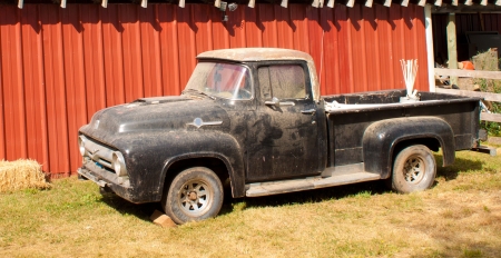 old pickup truck parked by a barn in Idahoの写真素材