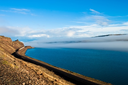 View from the road in washington at the columbia river with a train passing byの写真素材