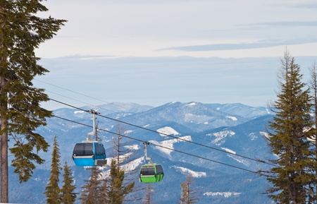 Gondola ride up to the top of the mountain of a ski resortの写真素材