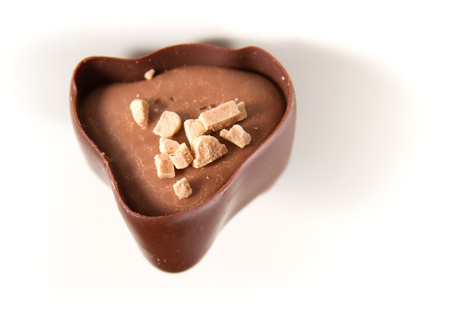 closeup of dark chocolate over a white backgroundの写真素材