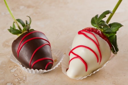 chocolate covered strawberries with dark and white chocolateの写真素材