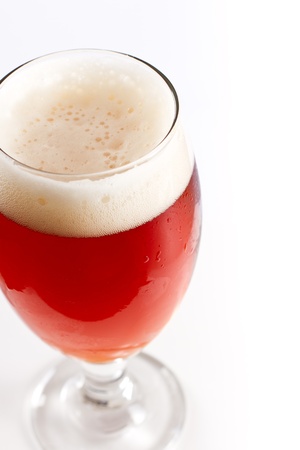 closeup of an irish red ale served on a white backgroundの写真素材