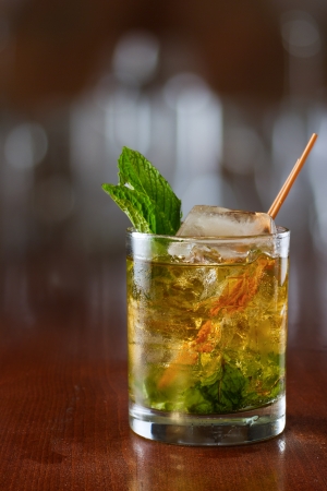 close up of a mint julep served on the rocks and garnished with fresh green mint on top, kentucky derby drinkの写真素材