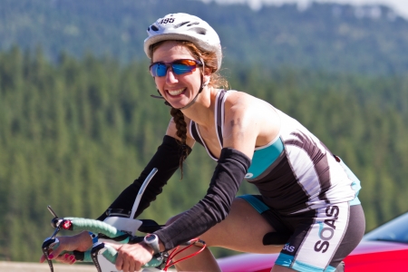 COEUR D ALENE, ID -  JUNE 23: Triathlete on the bike part of the ironman triathlon, June 23 2013 in Coeur dのeditorial素材