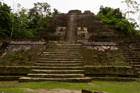 Large ancient Mayan Temple in the jungle of Lamananai Belizeの写真素材