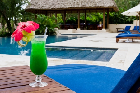 fresh tropical juice cocktail served pool side in Belizeのeditorial素材