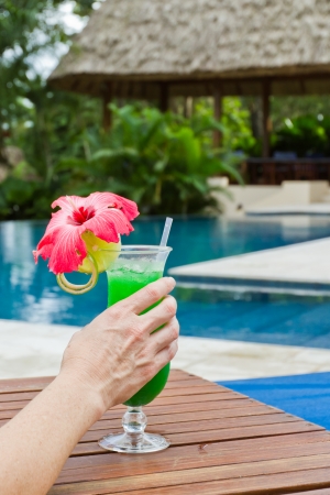 fresh tropical juice cocktail served pool side in Belizeのeditorial素材