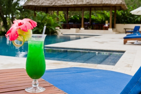 fresh tropical juice cocktail served pool side in Belizeのeditorial素材
