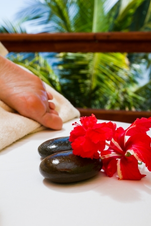details of a hot stone massage in tropical Belizeの写真素材