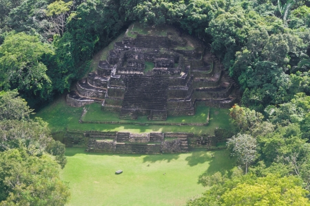 aerial view of the Temple in Lamanai maya ruins in the tropical jungle of Belizeの写真素材