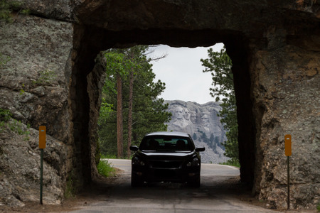 traveling from mount Rushmore with a view from a distant road tunnelのeditorial素材