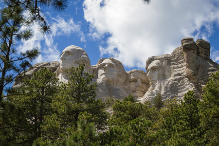 view of Mount Rushmore National Monument on a spring morning with some clouds and sunshineのeditorial素材