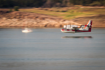 Lost Creek Lake, Oregon  - September 7 : Supperscooper plane after scoping water out of Lost Creek Lake to fight the 790 Fire, September 7 2014 in Lost Creek Lake, Prospect Oregonのeditorial素材