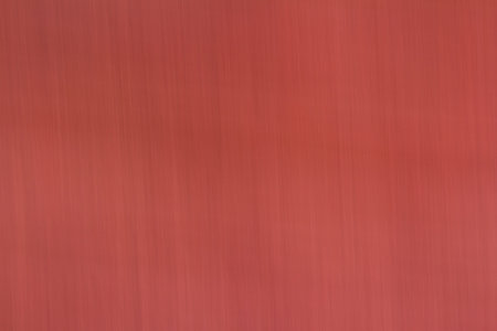 closeup blur of a sandstone wall in the Arizona desert with a slow shutter speed following the natural grain in the rockの写真素材