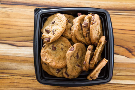 close up of home made chocolate chip cookies in a gift box