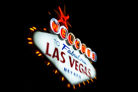 welcome to fabulous las vegas Nevada sign shot at night with a motion effect from the outside to the middle of the sign, effect done at the time of captureのeditorial素材