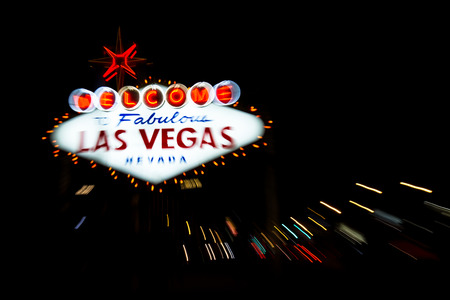 welcome to fabulous las vegas Nevada sign shot at night with a motion effect from the outside to the middle of the sign, effect done at the time of captureのeditorial素材