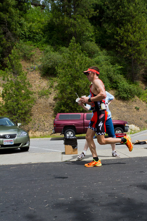 COEUR D ALENE, ID - JUNE 23: Ben hoffman, triathlete in the running event of the ironman in June 23 2013 in Coeur d' Alene Idahoのeditorial素材
