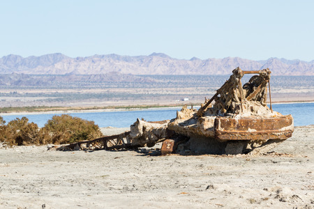 old piece of heavy machinery left to decay in Bombay Beach, Salton sea - California.の写真素材
