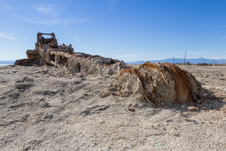 old piece of heavy machinery left to decay in Bombay Beach, Salton sea - California.の写真素材