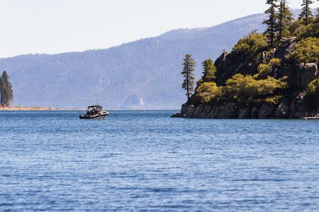 Lake Tahoe, California - April 29 : Fishing near Fannette Island on a small boat in a beautiful day, April 29 2015 Lake Tahoe, California.のeditorial素材