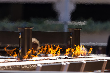 beautiful display of architecture and flames on a outdoor restaurant with style and comfortの写真素材