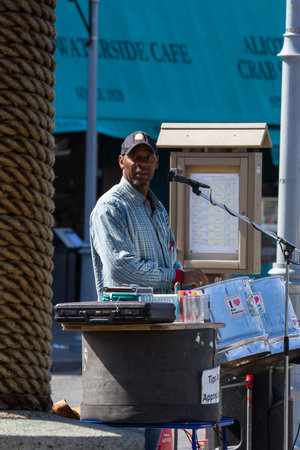 San Francisco, California - May 11 : Adult male performing for tips in the sidewalk of the...