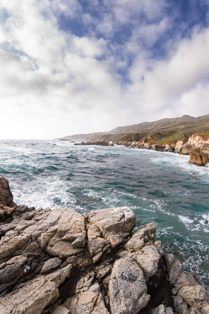 beautiful scene of the California coast on a cloudy day with its classic dramatic coastline lined with rocks and cliffsの写真素材