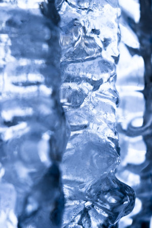 extreme cold winter temperatures and melting ice on the roof created beautiful icicles with patterns...