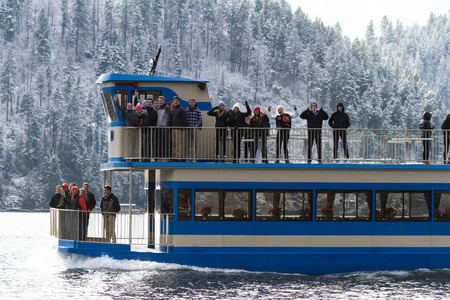 Coeur d' Alene, Idaho - December 16: Winter eagle watch tour boat with young people enjoying a beautiful winter day on lake CDA, December 16 2015 in Coeur d' Alene, Idahoのeditorial素材