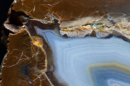 close up of a beautiful polished stone with a beautiful pattern with layers and colors