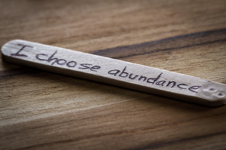 close up of a hand written message on a icesicle stick as a self esteem building conceptの写真素材