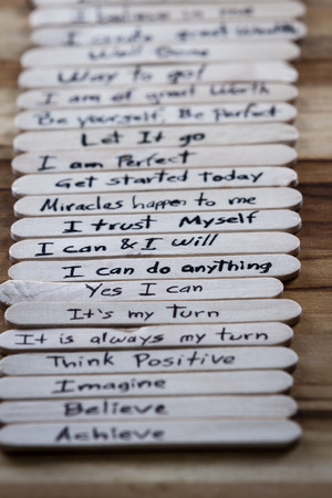 close up of a hand written message on a icesicle stick as a self esteem building conceptの写真素材