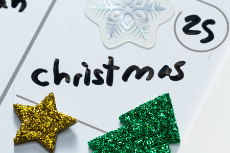 close up of a daily planner or calendar with a hand written message for a celebration or holidayの写真素材