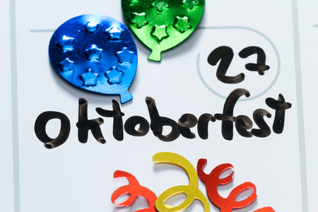 close up of a daily planner or calendar with a hand written message for a celebration or holidayの写真素材