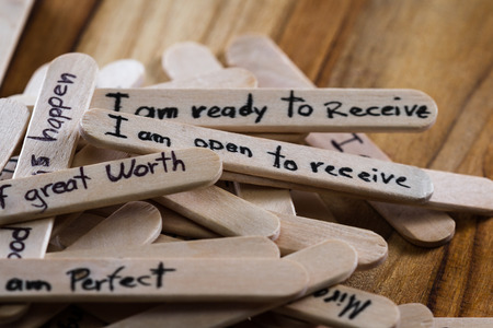 close up of a hand written message on a ice cream stick as a self esteem building conceptの写真素材