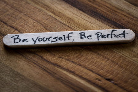 close up of a hand written message on a ice cream stick as a self esteem building conceptの写真素材