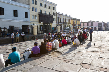 Lima - May 10 : People sitting in the church steps in the city of Lima. May 10 2016 Lima Peru.のeditorial素材