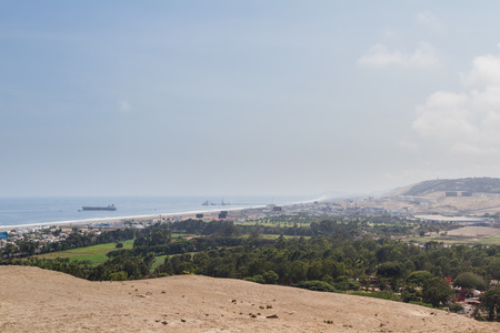 Pachacamac, Lima - May 10 : Oil refinery and port near the city of Lima, view with poor air quality in the summer time. May 10 2016 Pachacamac, Lima Peru.のeditorial素材
