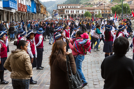 Cusco, Peru - May 12 : School children in uniform in a civic parade celebrating National Independence, parade known as the swearing of the School Police. May 12 2016, Cusco Peru.のeditorial素材