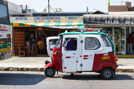Lima Peru - May 11 : Moto-taxi parked in front of a convenience store, Lima. May 11 2016, Lima Peru.